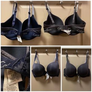 34D. 2 Calvin Klein bras. Lightly lined,Demi style